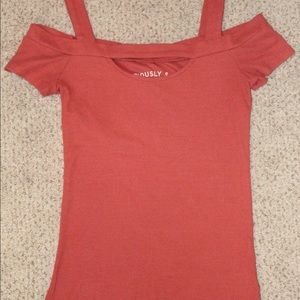 Strap off the shoulder cut out shirt